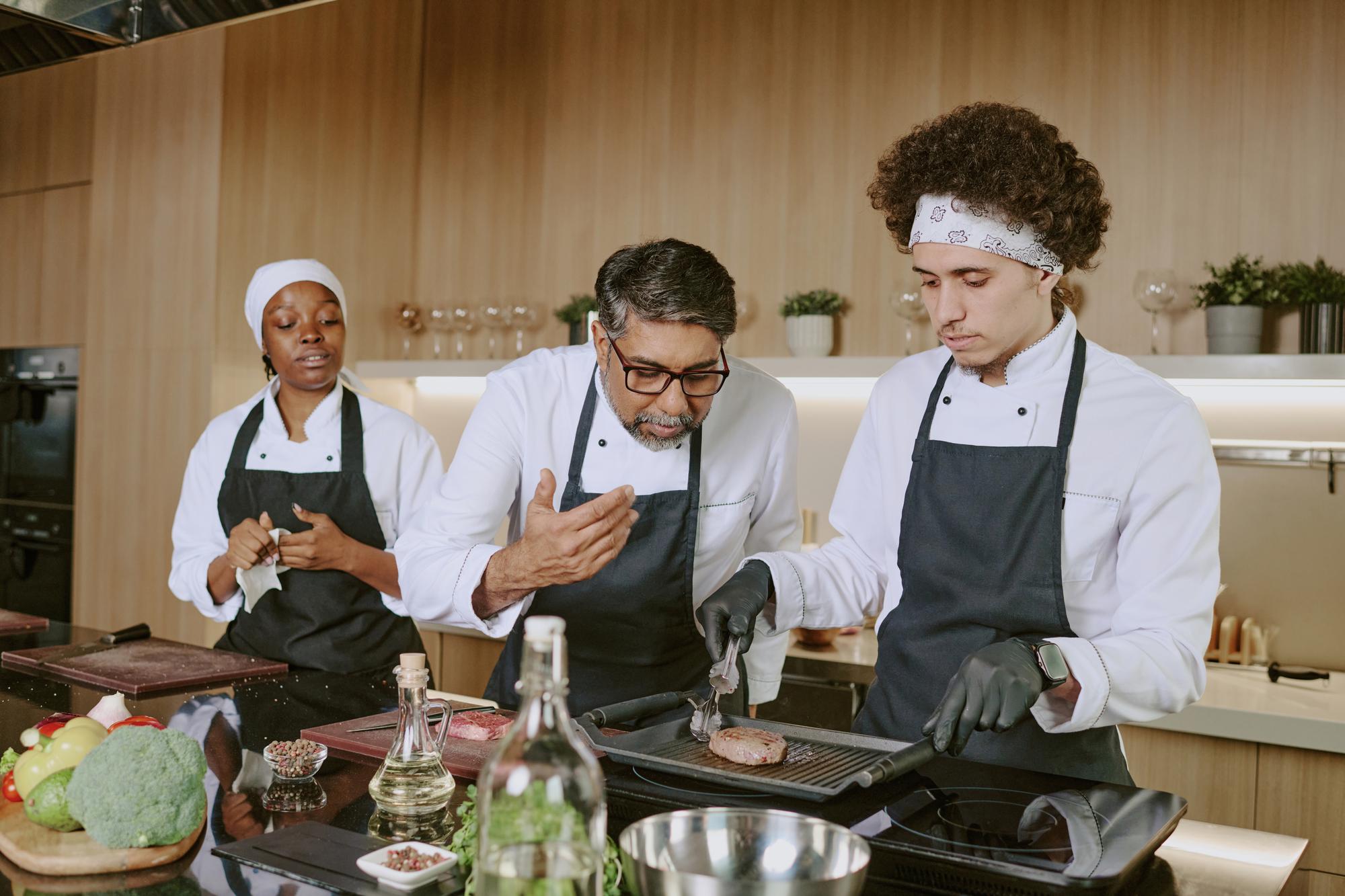 Team plating in a professional kitchen