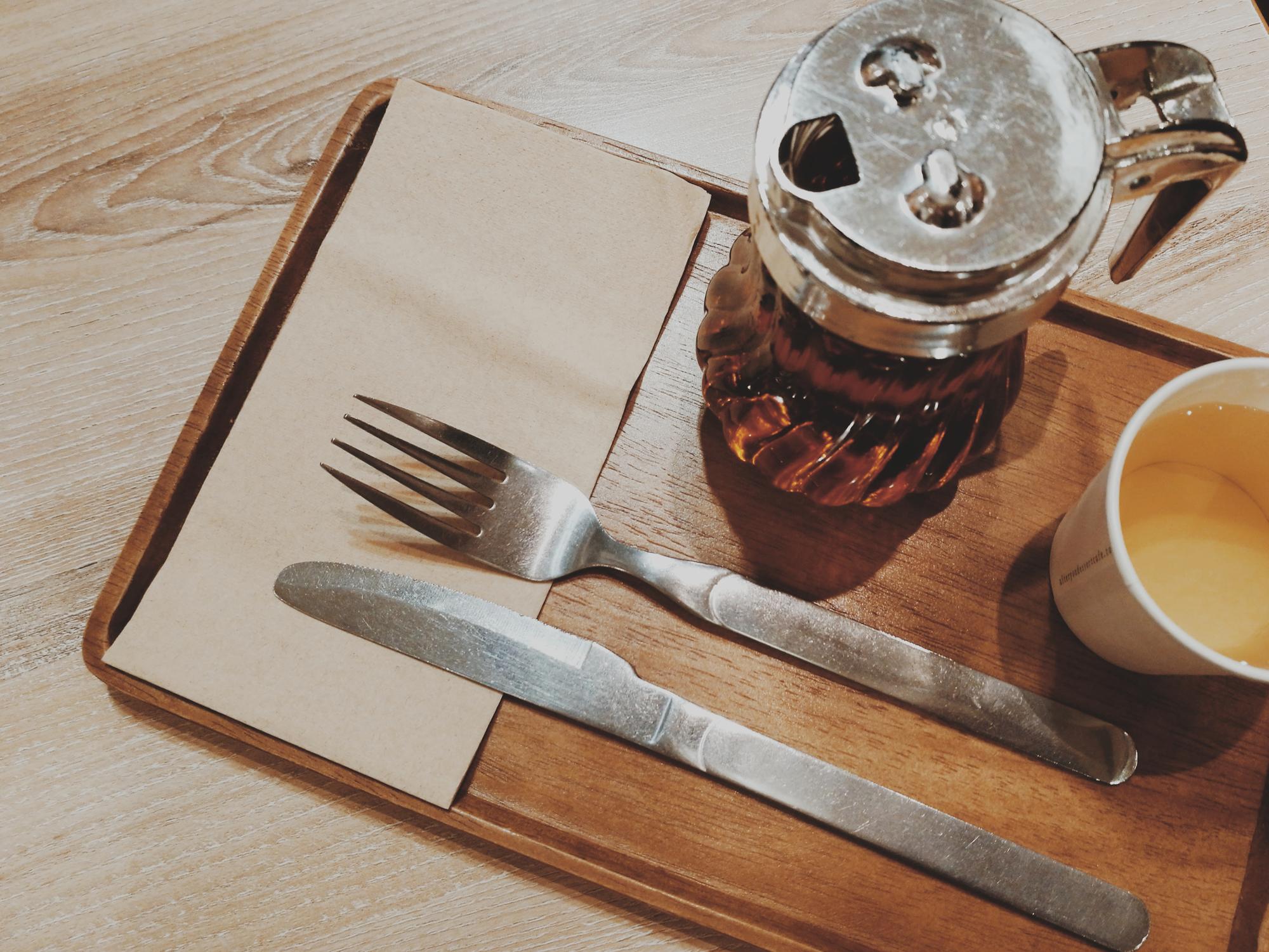 Printed menu on linen with utensils